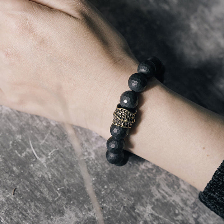 Bracelet de protection en cuivre et laiton avec onyx noir mat givré et Buddha Stones