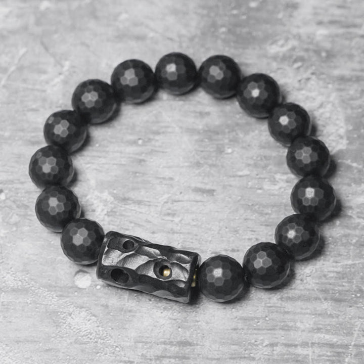 Bracelet de protection en ébène et onyx noir avec surface givrée mate Buddha Stones