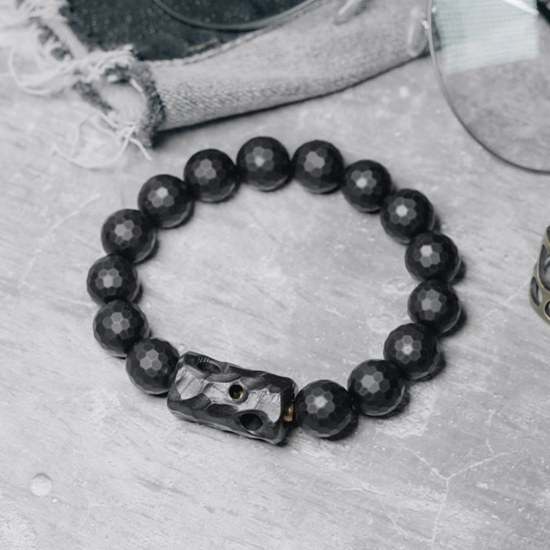 Bracelet de protection en ébène et onyx noir avec surface givrée mate Buddha Stones