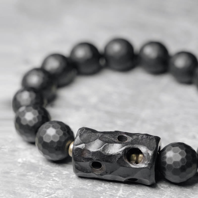 Bracelet de protection en ébène et onyx noir avec surface givrée mate Buddha Stones