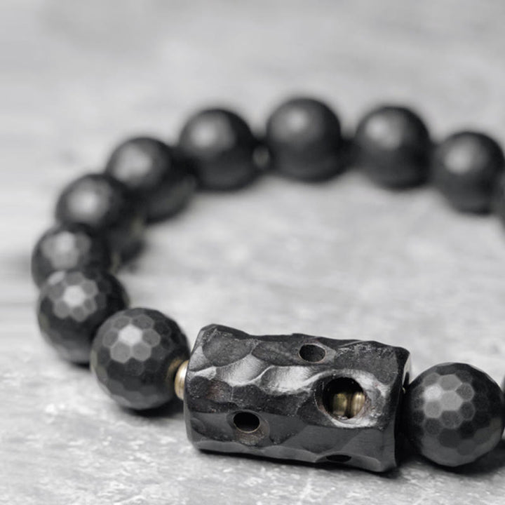 Bracelet de protection en ébène et onyx noir avec surface givrée mate Buddha Stones