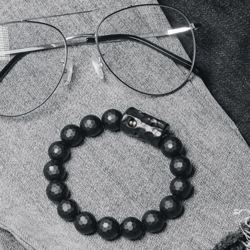 Bracelet de protection en ébène et onyx noir avec surface givrée mate Buddha Stones