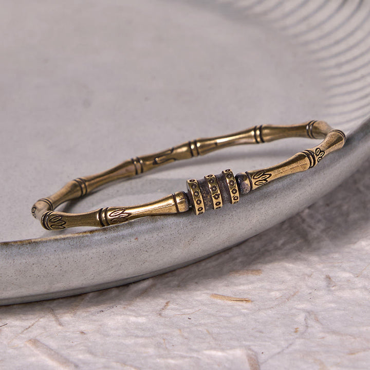 Bracelet de paix en cuivre et laiton avec Buddha Stones et fleur de lotus en bambou