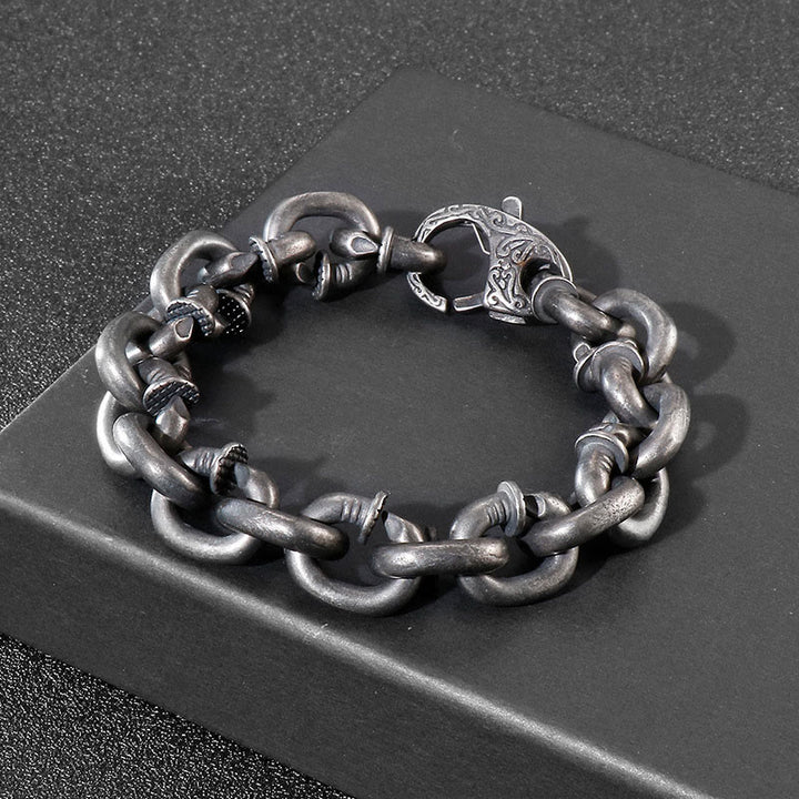 Bracelet porte-bonheur en acier titane avec rivets carrés et Buddha Stones