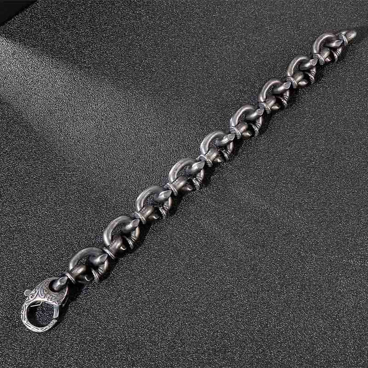 Bracelet porte-bonheur en acier titane avec rivets carrés et Buddha Stones