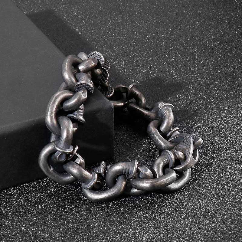 Bracelet porte-bonheur en acier titane avec rivets carrés et Buddha Stones