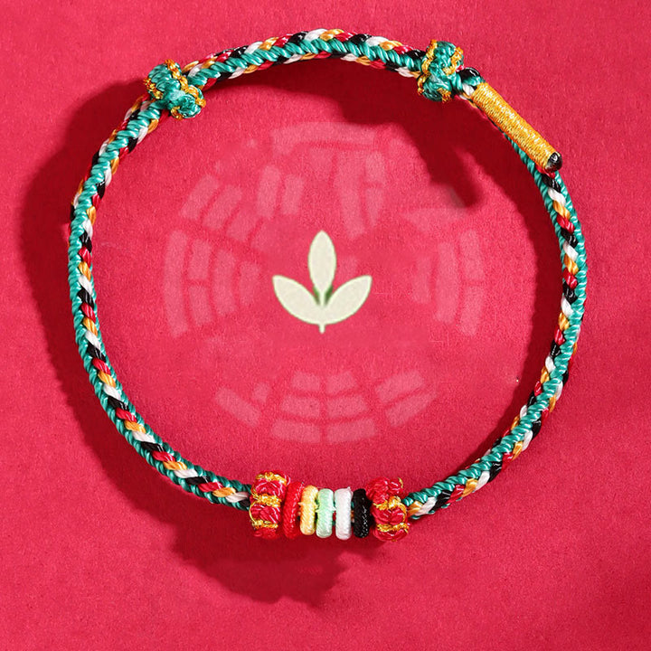 Bracelet porte-bonheur tressé avec nœud de récif et Buddha Stones et cinq éléments colorés