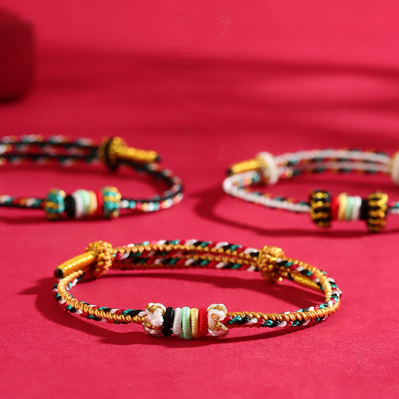 Bracelet porte-bonheur tressé avec nœud de récif et Buddha Stones et cinq éléments colorés