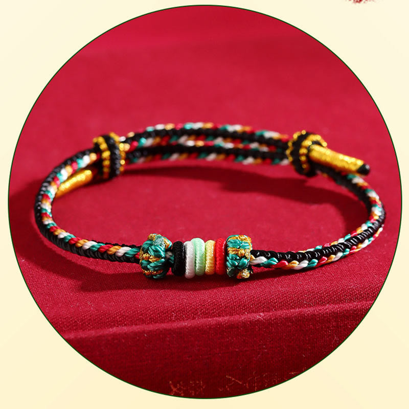 Bracelet porte-bonheur tressé avec nœud de récif et Buddha Stones et cinq éléments colorés