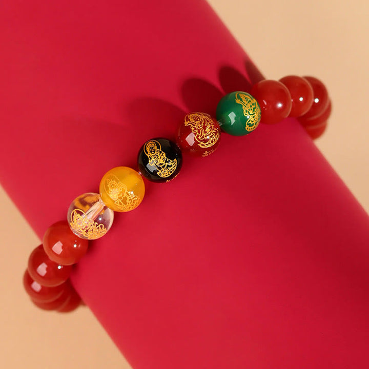 Bracelet porte-bonheur Jambhala en Buddha Stones et cinq éléments en agate