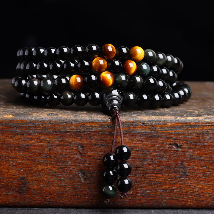 Bracelet Mala 108 perles en obsidienne noire avec Buddha Stones