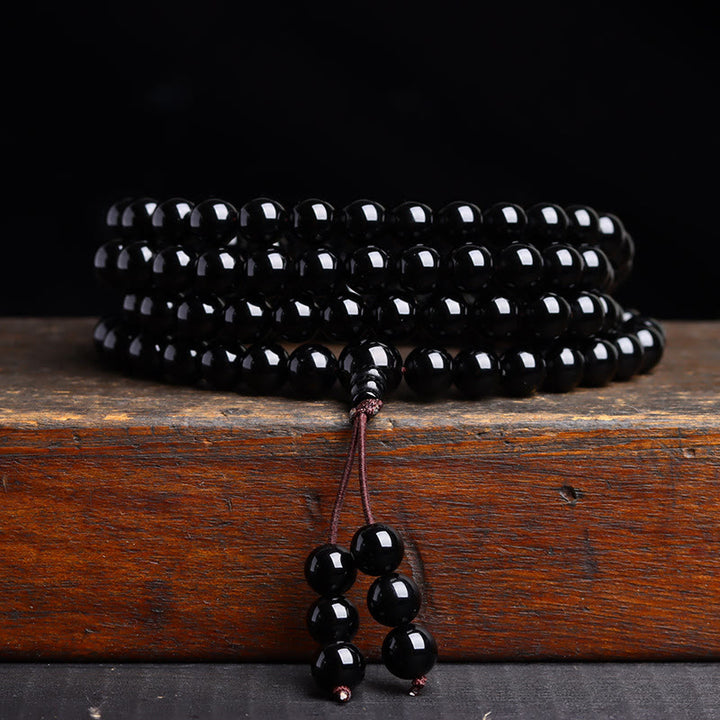 Bracelet Mala 108 perles en obsidienne noire avec Buddha Stones