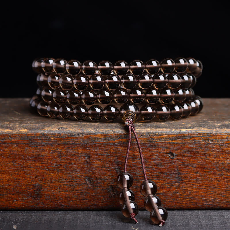 Bracelet Mala 108 perles en obsidienne noire avec Buddha Stones