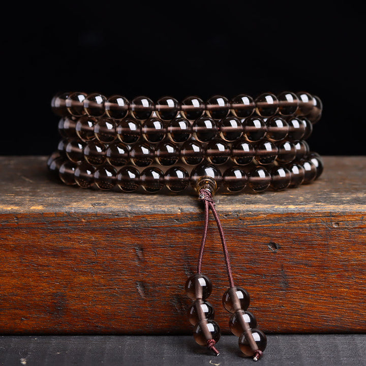 Bracelet Mala 108 perles en obsidienne noire avec Buddha Stones