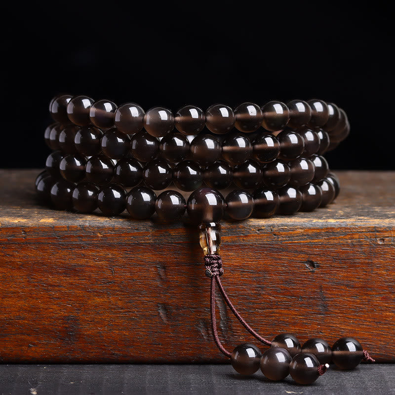 Bracelet Mala 108 perles en obsidienne noire avec Buddha Stones