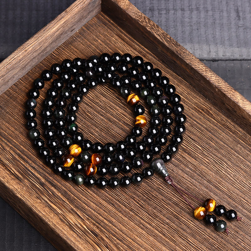 Bracelet Mala 108 perles en obsidienne noire avec Buddha Stones
