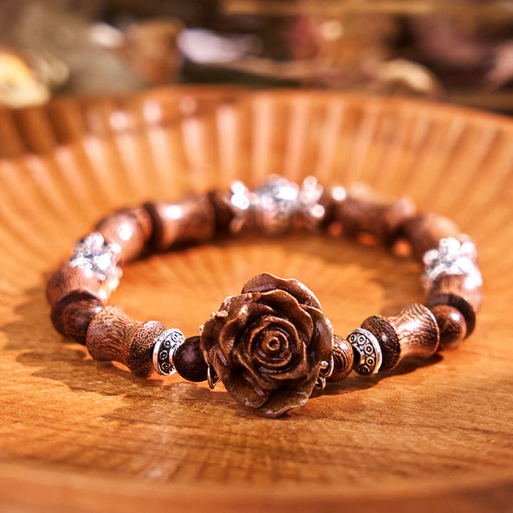 Bracelet de guérison camélia en bois de santal et bambou avec Buddha Stones