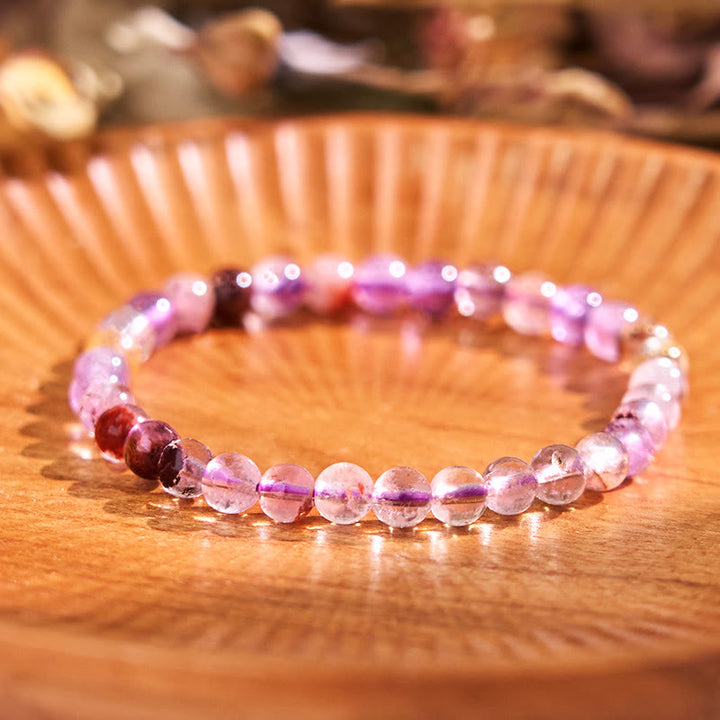 Bracelet de sagesse et d'amour fantôme violet naturel en Buddha Stones