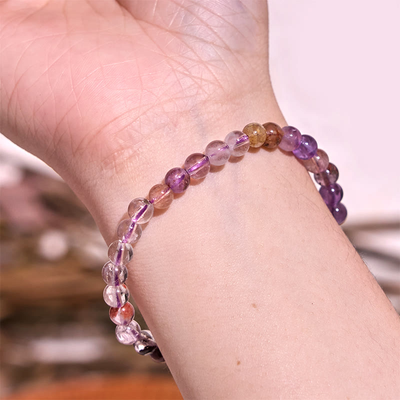 Bracelet de sagesse et d'amour fantôme violet naturel en Buddha Stones