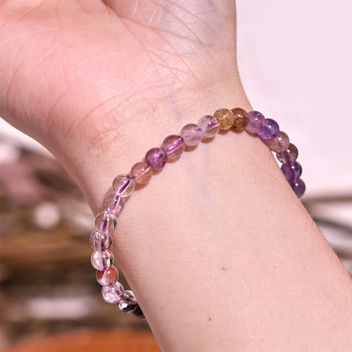 Bracelet de sagesse et d'amour fantôme violet naturel en Buddha Stones