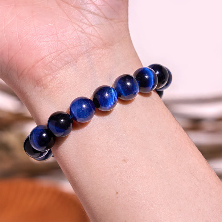 Bracelet d'équilibre en œil de tigre bleu Buddha Stones