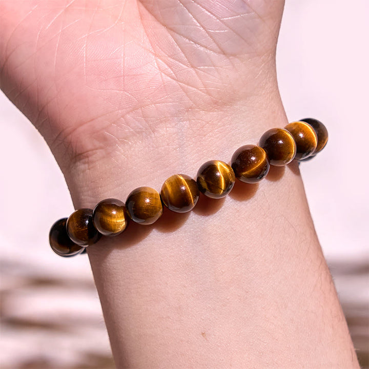 Bracelet de force en œil de tigre et Buddha Stones
