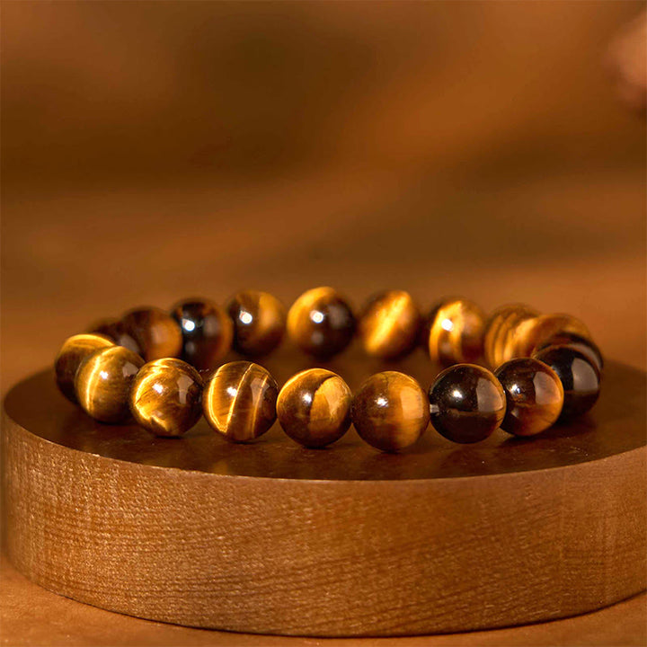 Bracelet de force en œil de tigre et Buddha Stones