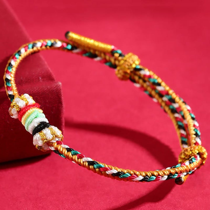 Bracelet porte-bonheur tressé avec nœud de récif et Buddha Stones et cinq éléments colorés