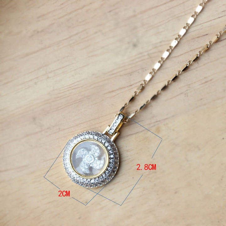 Collier pendentif rotatif en cuivre plaqué or et laiton avec moulin à vent et balance Fu