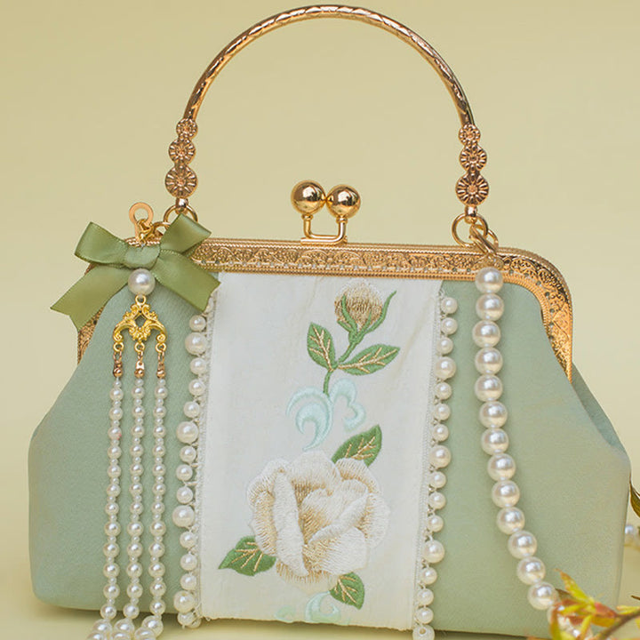 Sac à main avec chaîne en métal et pendentif en perles brodées de fleurs double face en Buddha Stones