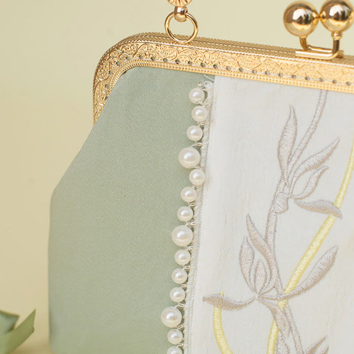 Sac à main avec chaîne en métal et pendentif en perles brodées de fleurs double face en Buddha Stones