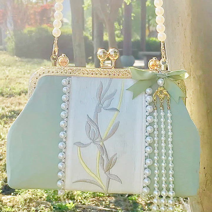 Sac à main avec chaîne en métal et pendentif en perles brodées de fleurs double face en Buddha Stones