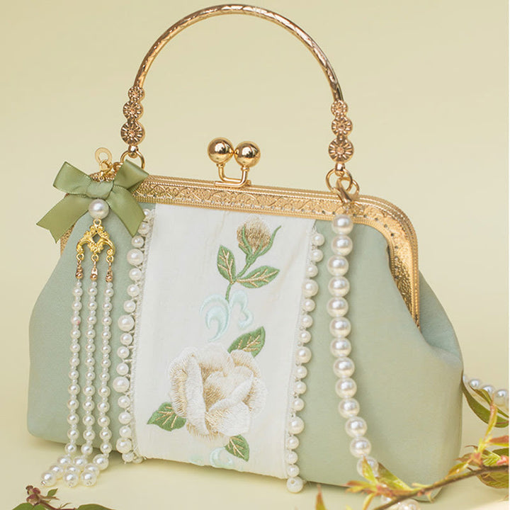 Sac à main avec chaîne en métal et pendentif en perles brodées de fleurs double face en Buddha Stones