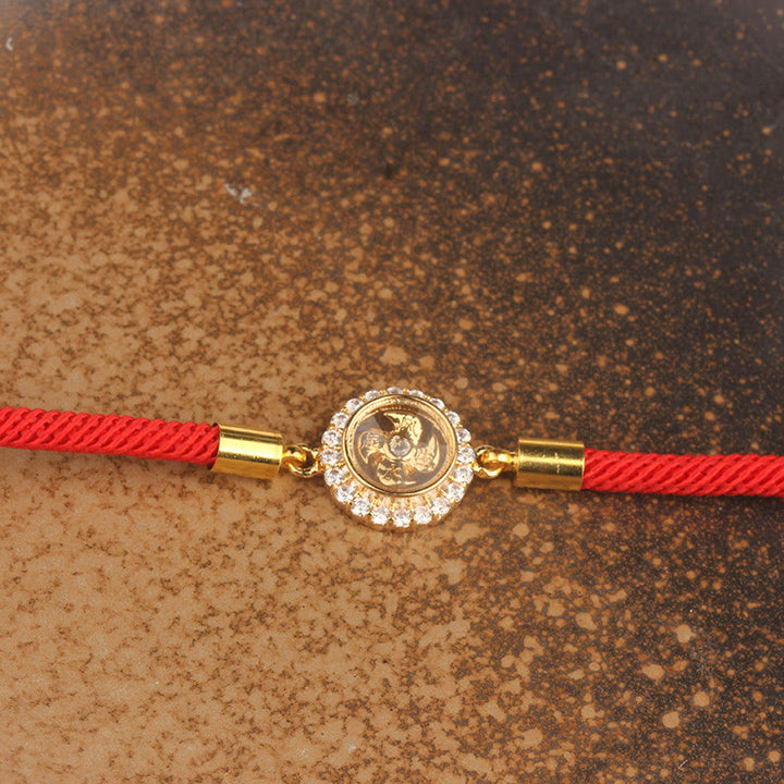 Bracelet tressé de protection Feng Sheng Shui Qi avec moulin à vent rotatif en cuivre et laiton Buddha Stones