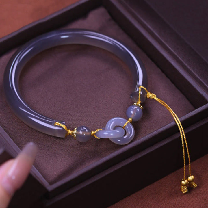 Bracelet manchette demi-jonc en cuivre et agate grise avec crochet en Buddha Stones