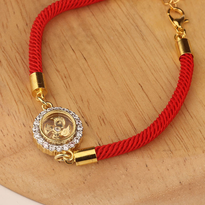 Bracelet tressé de protection Feng Sheng Shui Qi avec moulin à vent rotatif en cuivre et laiton Buddha Stones