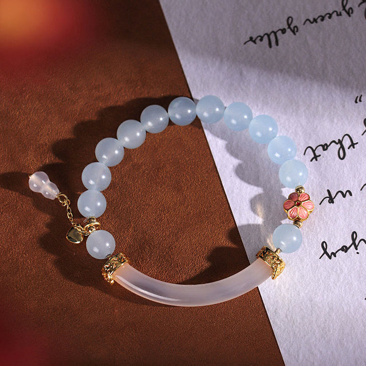 Bracelet manchette en perles de calcédoine bleue et cristal rose Buddha Stones