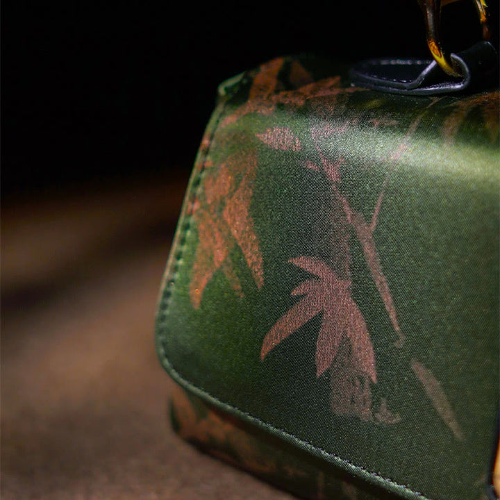 Sac à bandoulière en métal avec poignées en bambou et Buddha Stones