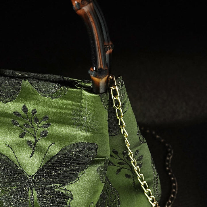Sac à bandoulière en métal avec poignée en bambou et fleurs en jacquard et papillons Buddha Stones