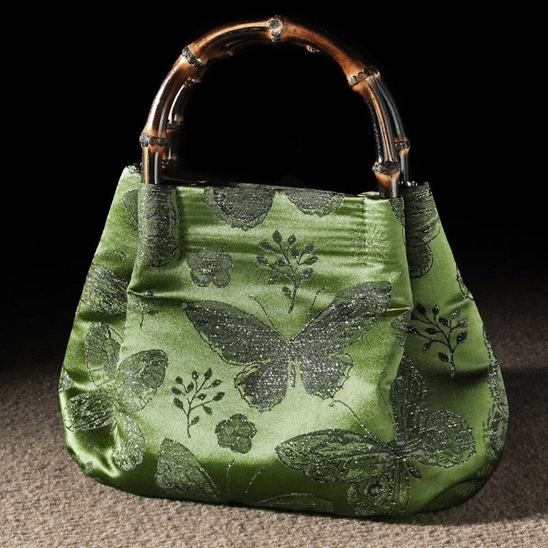 Sac à bandoulière en métal avec poignée en bambou et fleurs en jacquard et papillons Buddha Stones