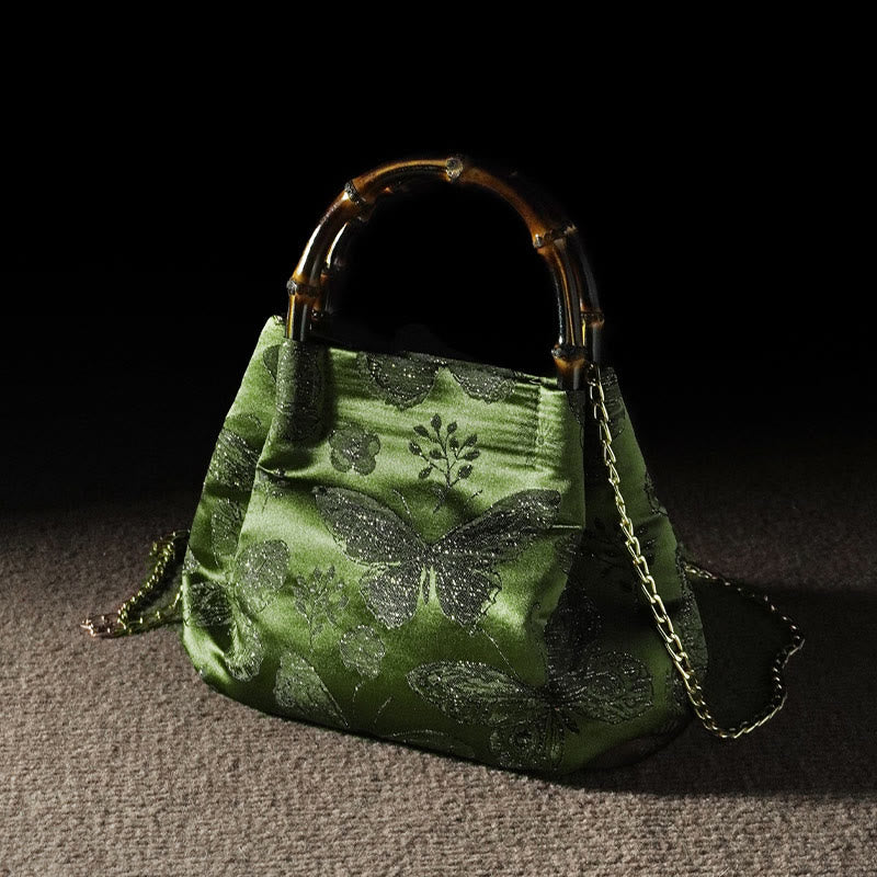 Sac à bandoulière en métal avec poignée en bambou et fleurs en jacquard et papillons Buddha Stones
