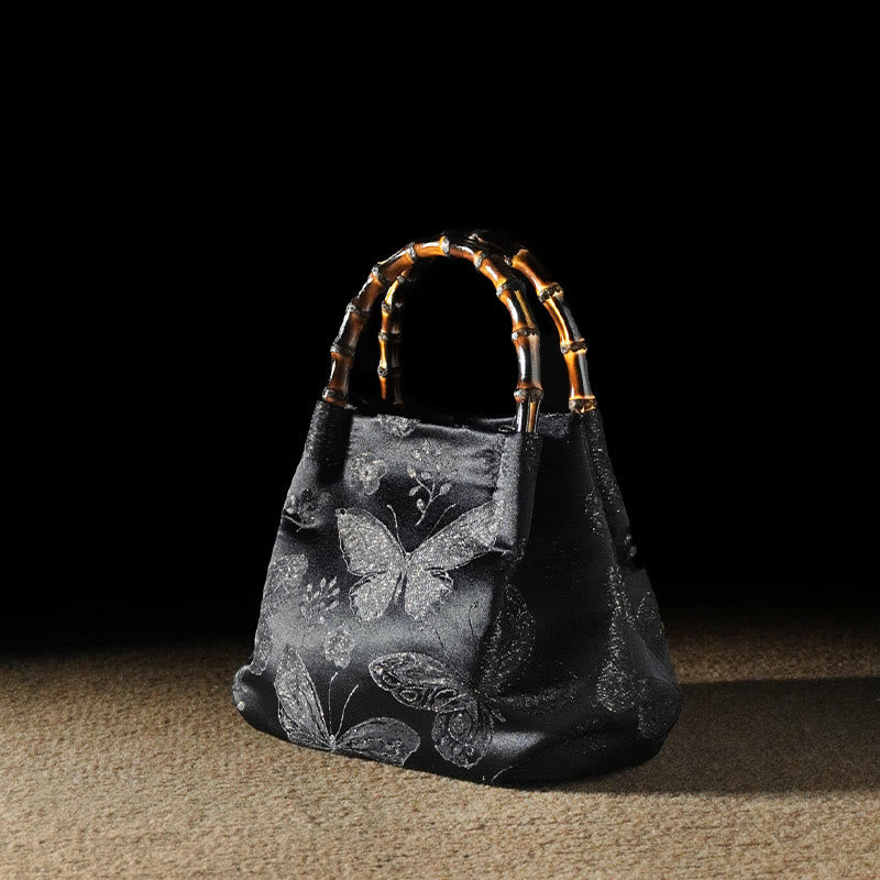 Sac à bandoulière en métal avec poignée en bambou et fleurs en jacquard et papillons Buddha Stones