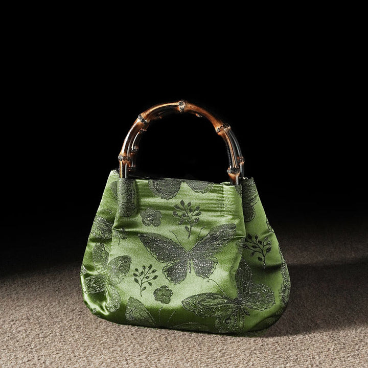 Sac à bandoulière en métal avec poignée en bambou et fleurs en jacquard et papillons Buddha Stones