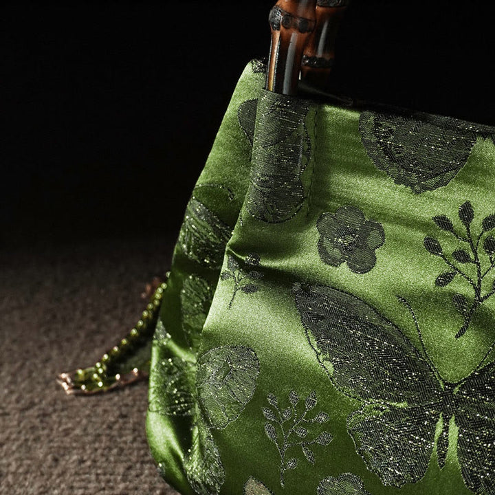 Sac à bandoulière en métal avec poignée en bambou et fleurs en jacquard et papillons Buddha Stones