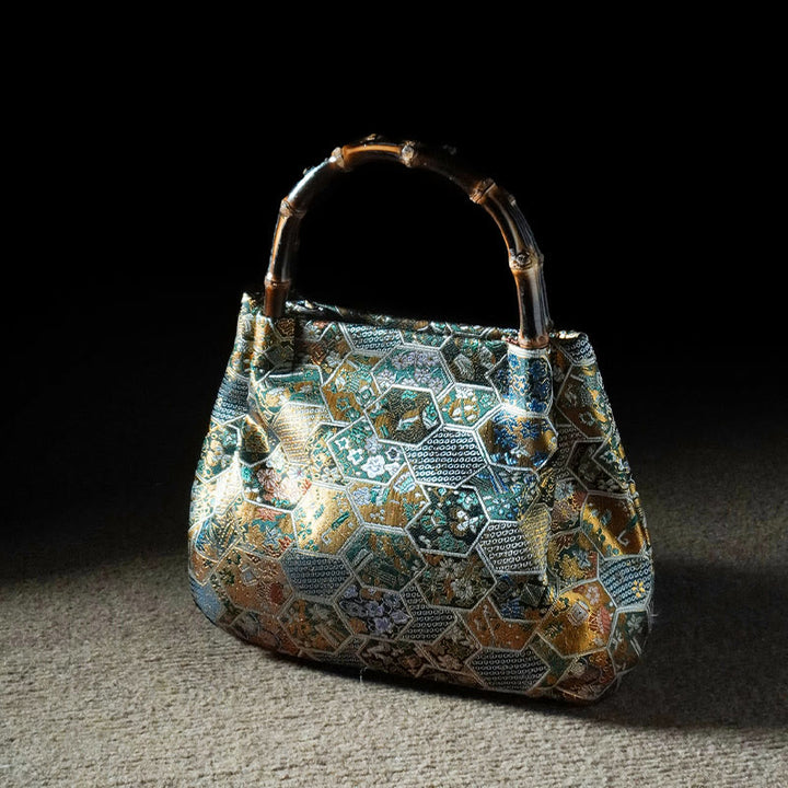 Sac à bandoulière en métal avec poignée en bambou et fleurs en jacquard et papillons Buddha Stones