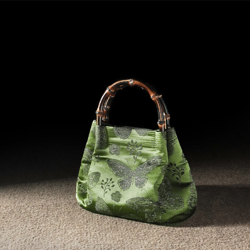 Sac à bandoulière en métal avec poignée en bambou et fleurs en jacquard et papillons Buddha Stones