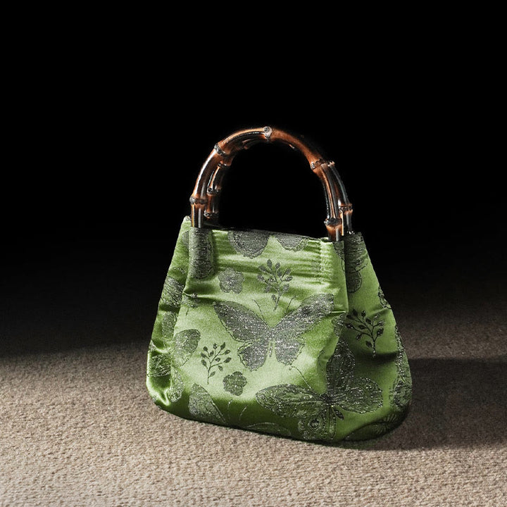 Sac à bandoulière en métal avec poignée en bambou et fleurs en jacquard et papillons Buddha Stones