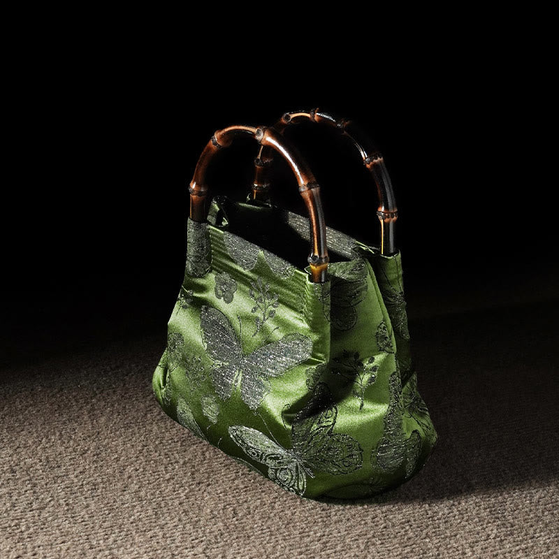 Sac à bandoulière en métal avec poignée en bambou et fleurs en jacquard et papillons Buddha Stones