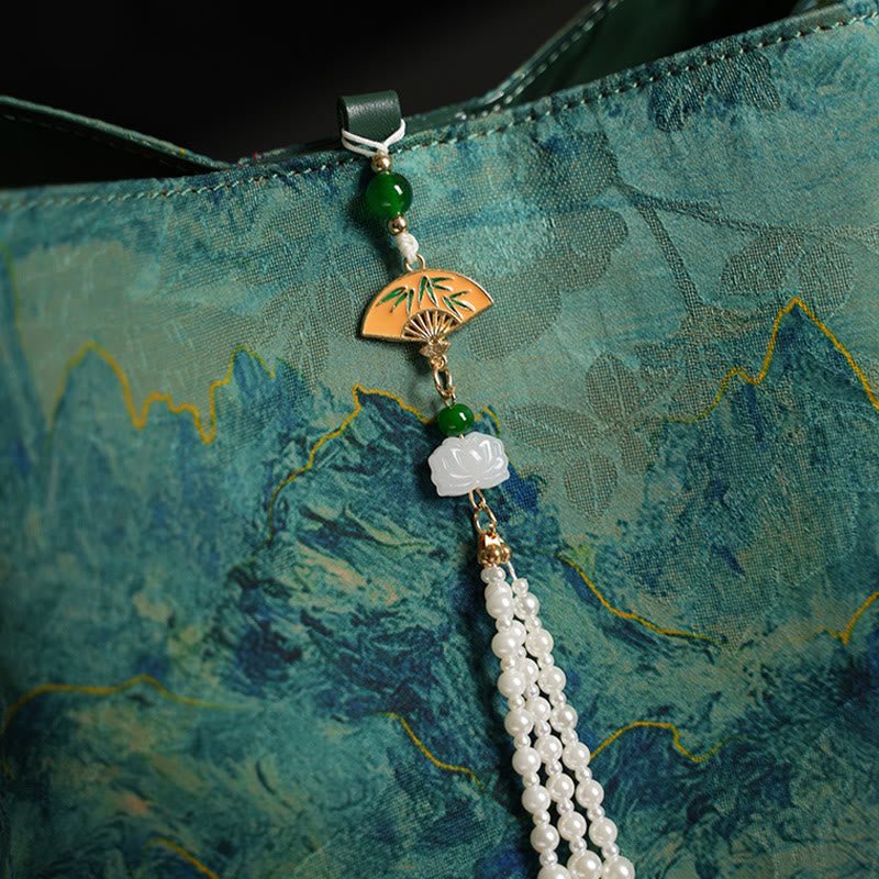 Sac à bandoulière en soie Xiangyunsha fait à la main avec perles de rivière et pompon en Buddha Stones