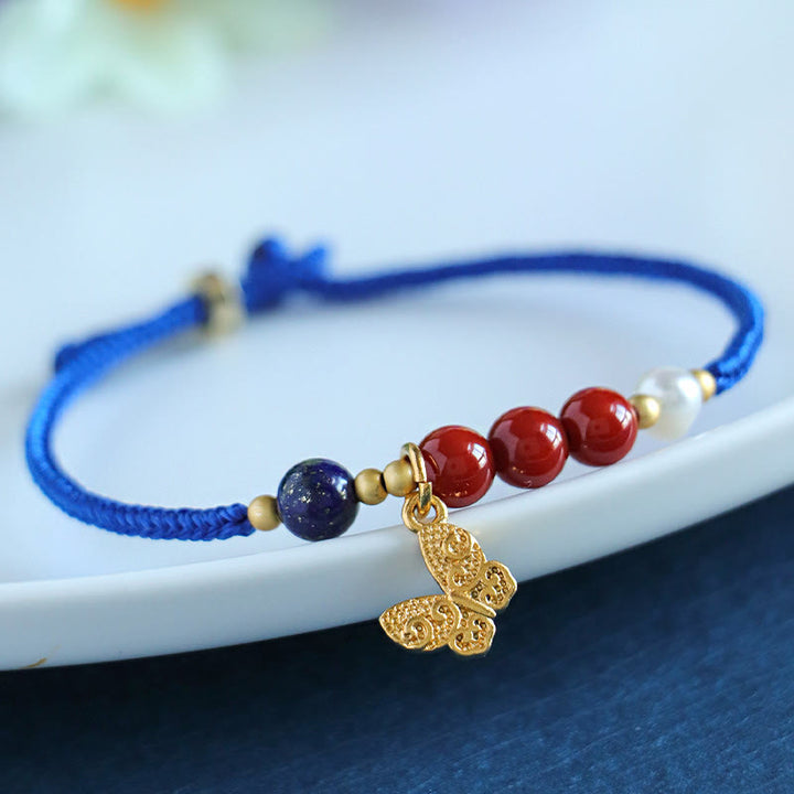 Bracelet en Buddha Stones, bleu Klein, agate rouge du Sud, grenat, aventurine bleue, lazurite, lapis-lazuli et cuivre, papillon, caractère Fu, positif - image 0